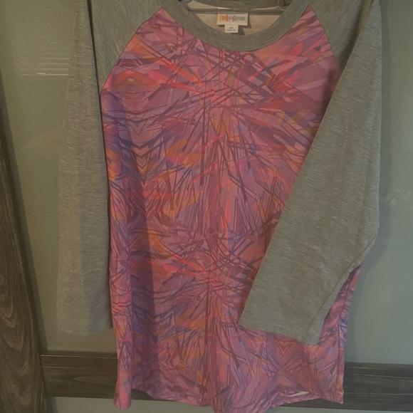 2- Lularoe Randy shirts. Disney print NWT and pink gently used. - Picture 6 of 6